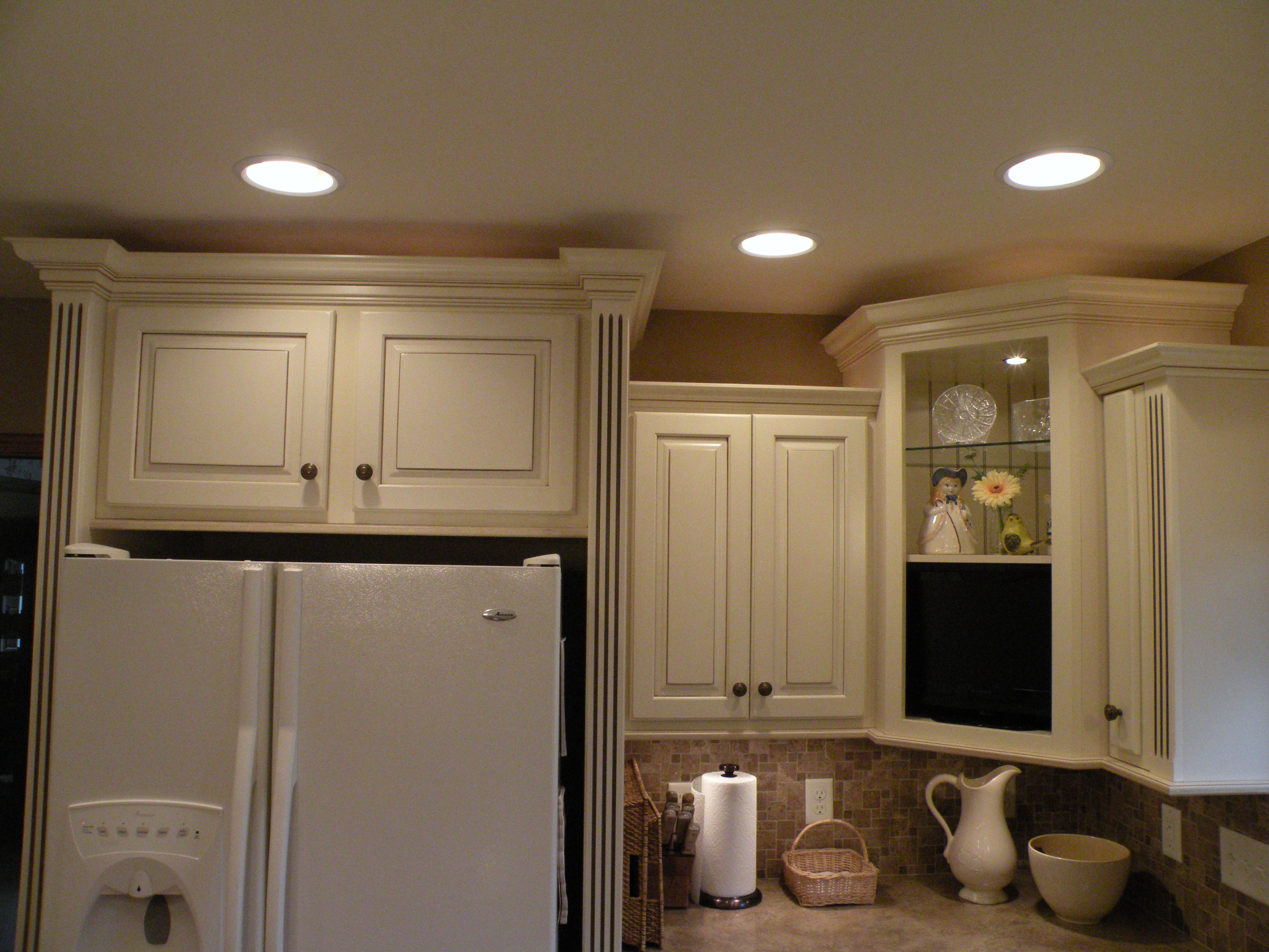 Biscotti Kitchen Cabinets With Light Granite Countertops With
